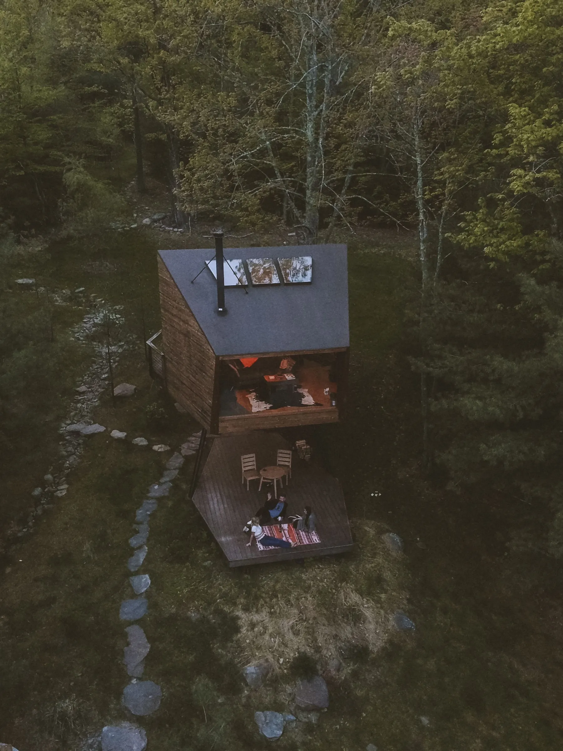 Aerial view of treehouse and surrounding deck